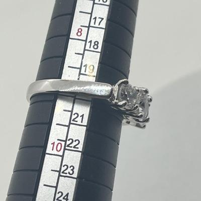 LOT 424: Two Sterling Silver Cubic Zirconia Rings - Size 8 and 9 - 6.4 GTW