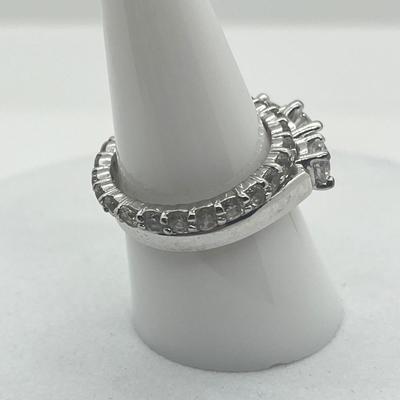 LOT 424: Two Sterling Silver Cubic Zirconia Rings - Size 8 and 9 - 6.4 GTW