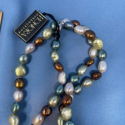 Sale Photo Thumbnail #434: Another great blue, gray, brown single strand.