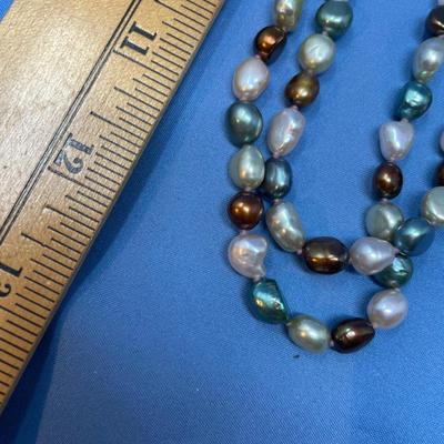 Sale Photo Thumbnail #435: Another great blue, gray, brown single strand.