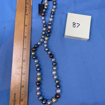 Sale Photo Thumbnail #444: Still with tag.  Sterling clasp