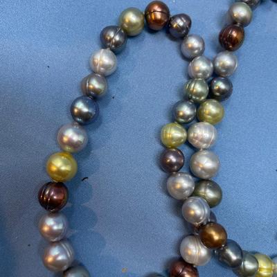 Sale Photo Thumbnail #446: Still with tag.  Sterling clasp