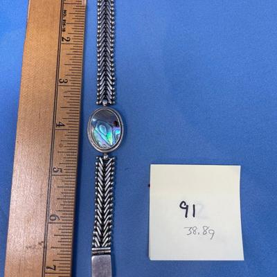 Sale Photo Thumbnail #458: Great sterling silver piece!  There is a hole (dark spot) on the abalone; but still displays great!  38.8 grams total weight.