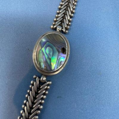 Sale Photo Thumbnail #459: Great sterling silver piece!  There is a hole (dark spot) on the abalone; but still displays great!  38.8 grams total weight.