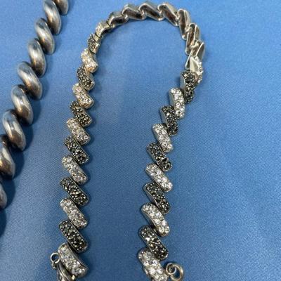 Sale Photo Thumbnail #483: The one has black/ clear CZs.  Both in good shape, ready to wear.  44.2 grams total weight.