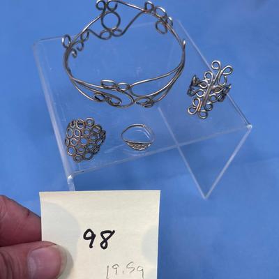 Sale Photo Thumbnail #486: 19.5 grams total weight.  Bracelet & 3 rings.  Rings are size 8 approximately.