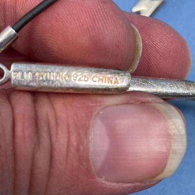 Sale Photo Thumbnail #504: Don't know what this is supposed to be, as it is on a long wire.  I would definitely suggest repurposing them!  12.5 grams total weight.