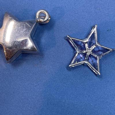 Sale Photo Thumbnail #511: The one has alexandrite czs.  The other is hollow. 13.2 grams total weight.