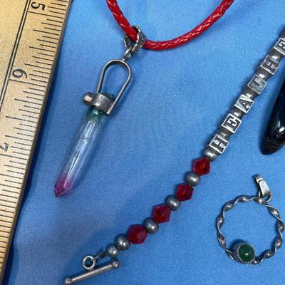 Sale Photo Thumbnail #517: Crystals & a Heather bracelet.  29.5 grams total weight (leather strap included)