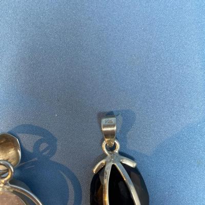 Sale Photo Thumbnail #534: The one on the right is amethyst color. 26.4 grams total weight.