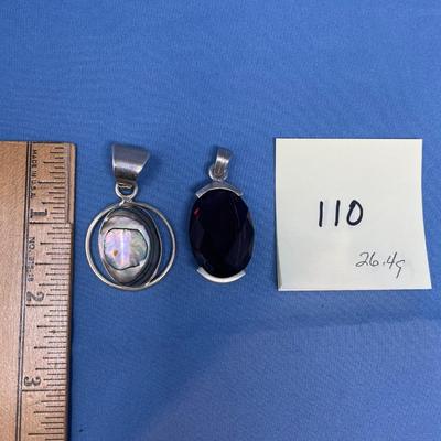 Sale Photo Thumbnail #531: The one on the right is amethyst color. 26.4 grams total weight.