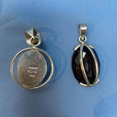 Sale Photo Thumbnail #533: The one on the right is amethyst color. 26.4 grams total weight.