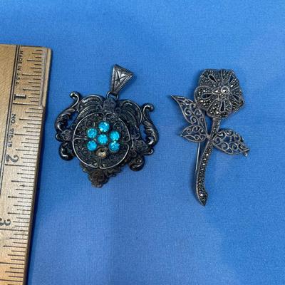 Sale Photo Thumbnail #540: The pendant does have a stone missing.  The rose brooch is great & ready to wear! 28.8 grams total weight.