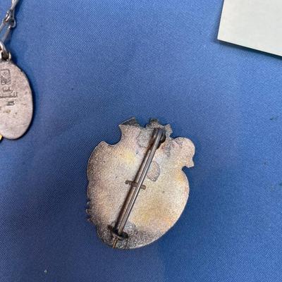 Sale Photo Thumbnail #548: The badges are cool!  The necklace has a brass heart.  25.9 grams total weight.