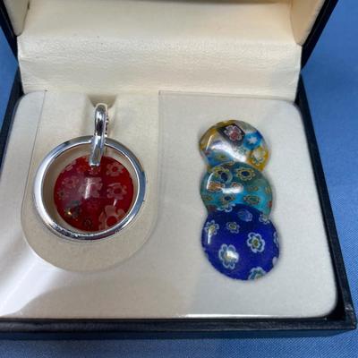 Sale Photo Thumbnail #574: New in box!  4 interchangeable glass discs. Sterling silver frame and chain.
