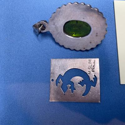 Sale Photo Thumbnail #584: M. Slim salamander sterling piece.  Green Apple Amber pendant.  Both in great shape! 19.1 grams total weight.