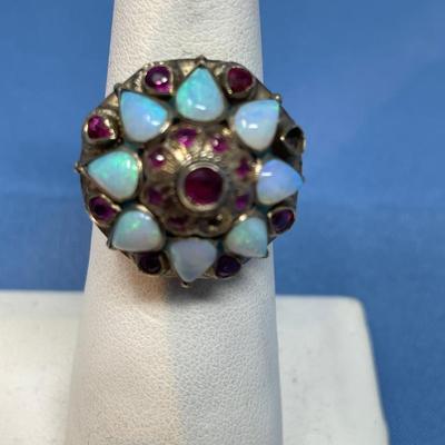 Sale Photo Thumbnail #587: One of the outer garnets is missing. Great tall dome ring, almost can be a poison ring.  Very nice piece 135+ years old!  5.8 grams total weight!