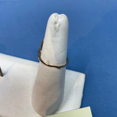 Sale Photo Thumbnail #606: Today this would be considered a ladies ring, but in the 1920s when it was made, it was for a man.
Ring needs band repair, so it can be sized to whatever you need.  Or make it into a pendant! 4.9 grams total weight.