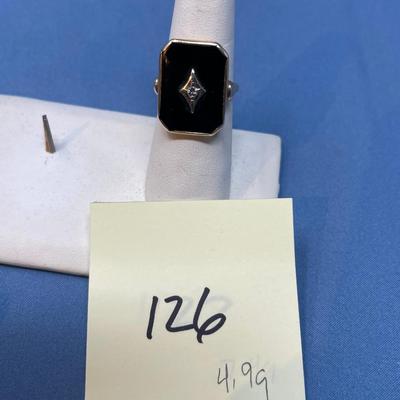 Sale Photo Thumbnail #603: Today this would be considered a ladies ring, but in the 1920s when it was made, it was for a man.
Ring needs band repair, so it can be sized to whatever you need.  Or make it into a pendant! 4.9 grams total weight.