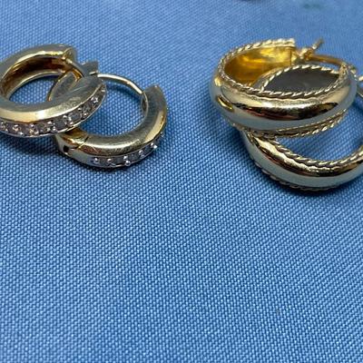 Sale Photo Thumbnail #610: 3 sets, the hoops are heavier weight.  The shell looking ones are thin gold. 7.4 grams total weight.