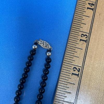 Sale Photo Thumbnail #615: 17.6 grams total weight. 14K gold beads & clasp.  Tiger eye nuggets w/ onyx beads.  Very classy.