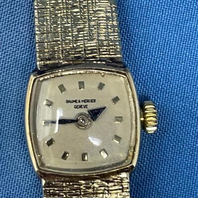 Sale Photo Thumbnail #624: B&M Square 80s ladies watch.
14K gold band as well.
Light scratching on the back of
case.  Works great, keeps good time.
20.2 grams total weight (movement not included)
That's a lot of gold!