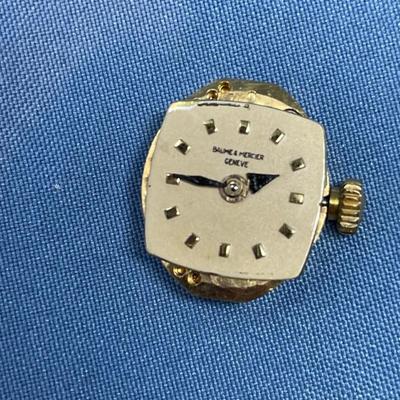 Sale Photo Thumbnail #628: B&M Square 80s ladies watch.
14K gold band as well.
Light scratching on the back of
case.  Works great, keeps good time.
20.2 grams total weight (movement not included)
That's a lot of gold!