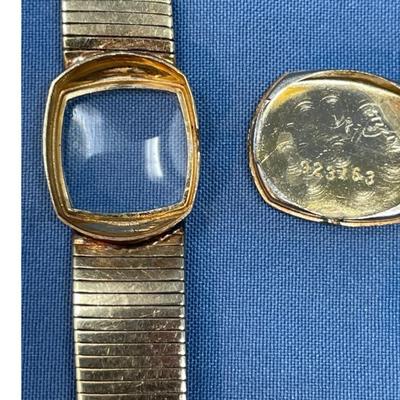 Sale Photo Thumbnail #627: B&M Square 80s ladies watch.
14K gold band as well.
Light scratching on the back of
case.  Works great, keeps good time.
20.2 grams total weight (movement not included)
That's a lot of gold!
