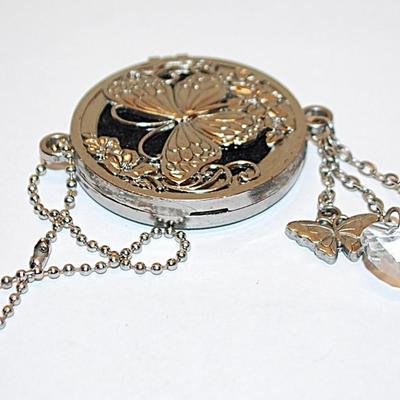 Round Butterfly Hinged AROMATHERAPY CASE (1¾" Diam.) with Foam Insert and Accent Dangles and 3" Silver Tone Chain