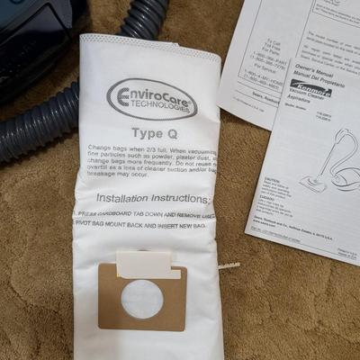 Kenmore canister vacuum with hepa filter.