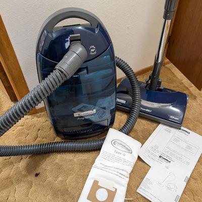 Kenmore canister vacuum with hepa filter.