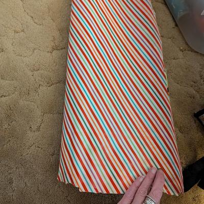 Container with wrapping paper