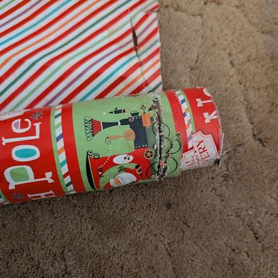Container with wrapping paper