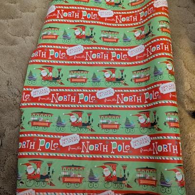 Container with wrapping paper