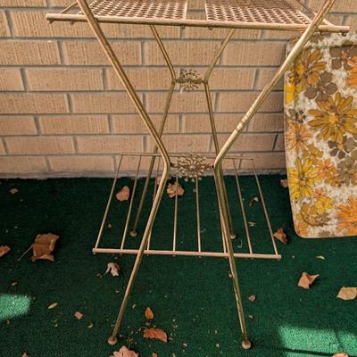 Vintage mid century, gold tone, wire plant or record stand.