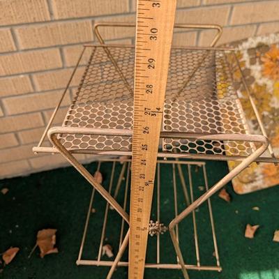 Vintage mid century, gold tone, wire plant or record stand.