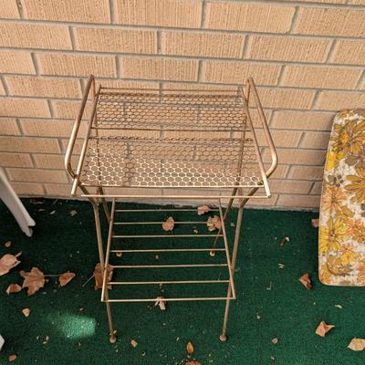 Vintage mid century, gold tone, wire plant or record stand.