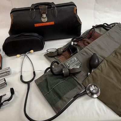 Sale Photo Thumbnail #52: Classic doctor's bag, vintage medical examination items as shown in photos.
