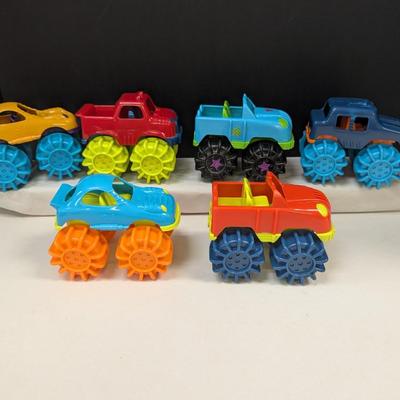 Plastic Battat Mini Monster Trucks w/ Big Wheel Tires