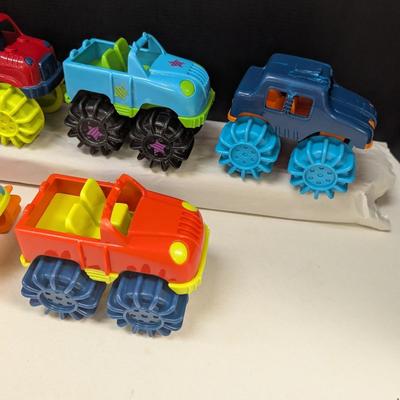 Plastic Battat Mini Monster Trucks w/ Big Wheel Tires