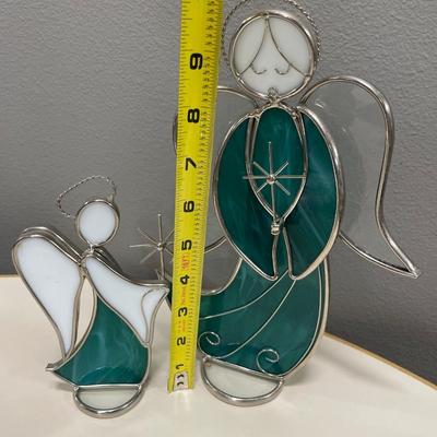Green and white stain glass angels