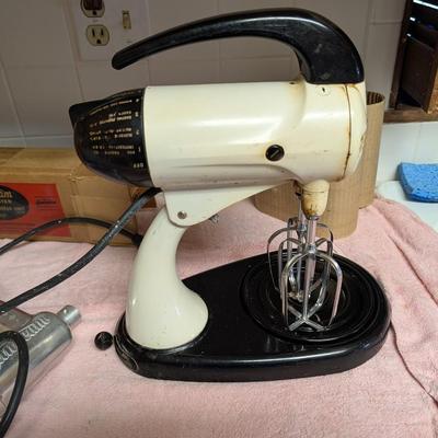 Antique Sunbeam mixmaster with different attachments