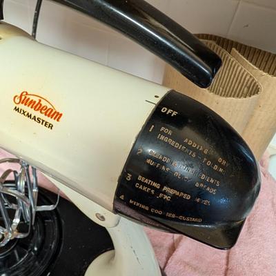 Antique Sunbeam mixmaster with different attachments