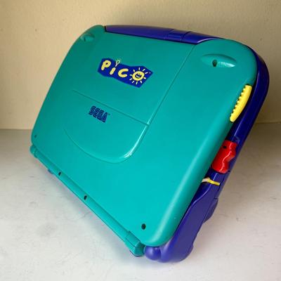 Sale Photo Thumbnail #493: From 2013. Very clean, has 1 storybook inside (see photos), power cord not included.  No games included. Untested.