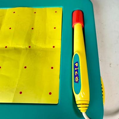 Sale Photo Thumbnail #499: From 2013. Very clean, has 1 storybook inside (see photos), power cord not included.  No games included. Untested.