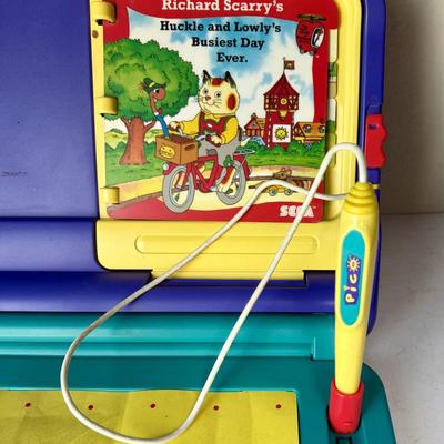 Sale Photo Thumbnail #501: From 2013. Very clean, has 1 storybook inside (see photos), power cord not included.  No games included. Untested.