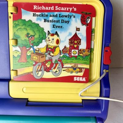 Sale Photo Thumbnail #500: From 2013. Very clean, has 1 storybook inside (see photos), power cord not included.  No games included. Untested.