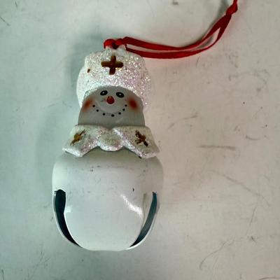 Sale Photo Thumbnail #514: Cute Glass ornament with a bell as a base. Approx. 2.25" tall.