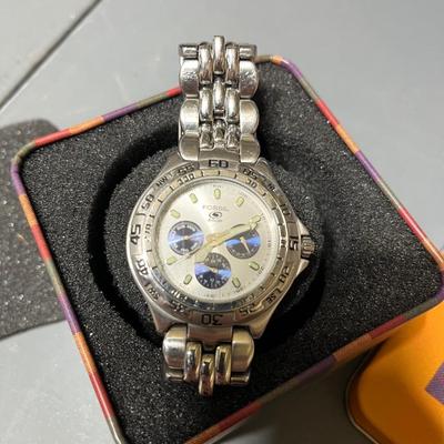 Sale Photo Thumbnail #249: In great condition and comes with original protective tin.  Will need new battery.

*shipping available at buyers expense