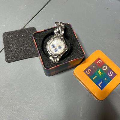 Sale Photo Thumbnail #250: In great condition and comes with original protective tin.  Will need new battery.

*shipping available at buyers expense